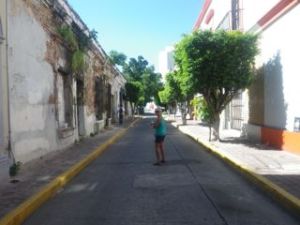 Dale insisted on taking a pic of me walking down the street, so I took one of her doing that. :)