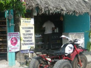 There's a TelCel store (of sorts) on Isla! The sign says that they sell equipment, parts, and SIM cards; do repairs; sell refills, and more!