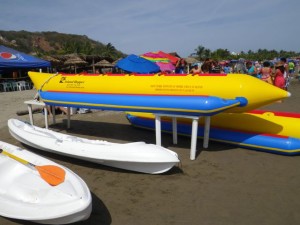 These banana ride on top boats are very popular here.