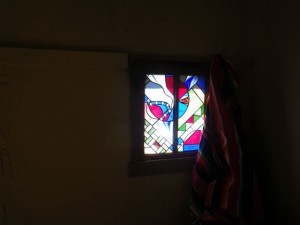 Stained glass window in the bedroom.