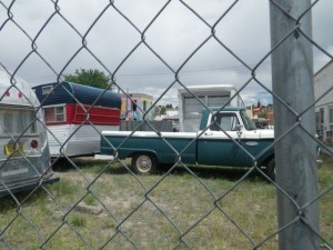 Old Ford hitched to the trailer.