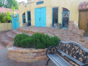 I love the adobe, the blues, and the bricks altogether. I am rethinking the style for my cabin. :)