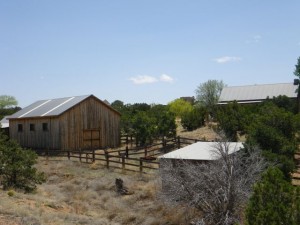 I love the combination of the wood barn in the foreground and the adobe building in the background.