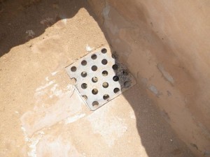 This drain is original! The holes in it are perfectly round!