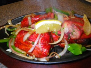 Tandoori chicken with onions and peppers.