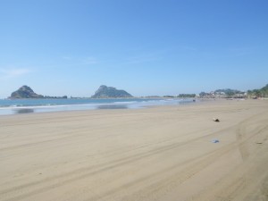 Low tide on an almost deserted beach. Looking towards Isla de Chivas and the Faro.